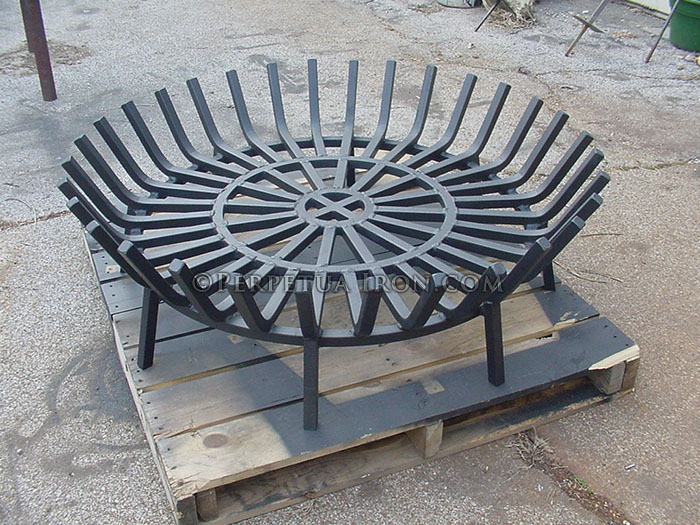 custom built, heavy duty fire grate for an outside fireplace radially symmetric, circular pattern
