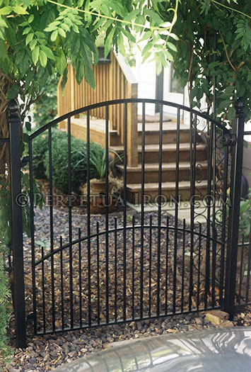 Custom iron gate for a garden.