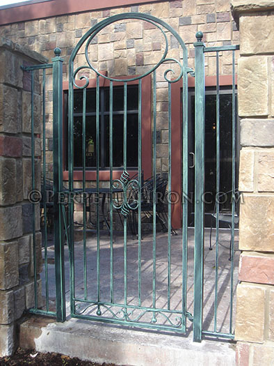 custom arched gate with basket motif