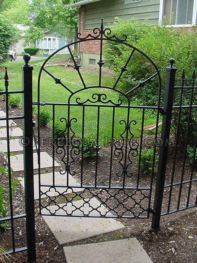 Decorative iron garden gate, cast iron components.