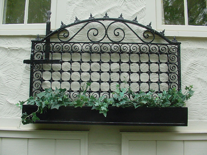 A gate adapted as a flowerbox.