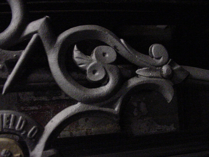 detail of 35.1, crest decoration, serpent face.
