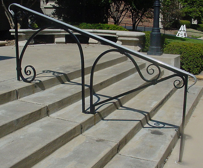 Staricase railing for a church, maybe modern construction, but beautifully built.