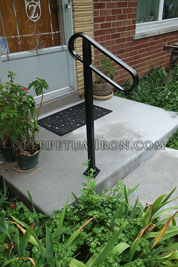Adjus Wrought Iron Plain Handrail on Two Posts one bolt down, one concrete in 