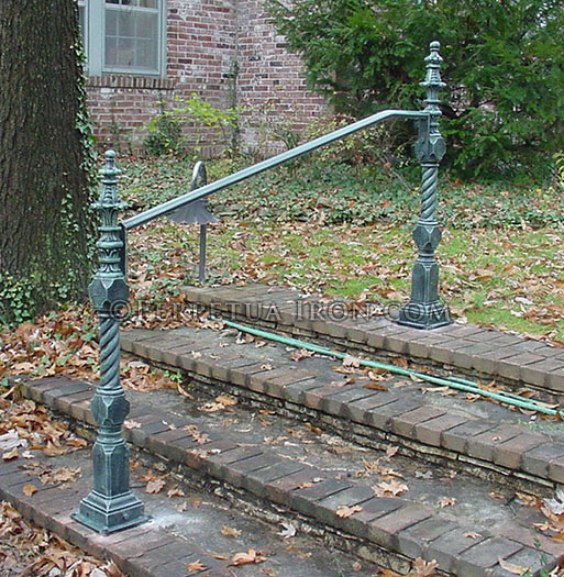 Exterior railing,  wrought iron, hand rail only, antique posts.