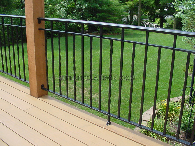 Deck wrought iron railing, 3 channel design, alternating twists.